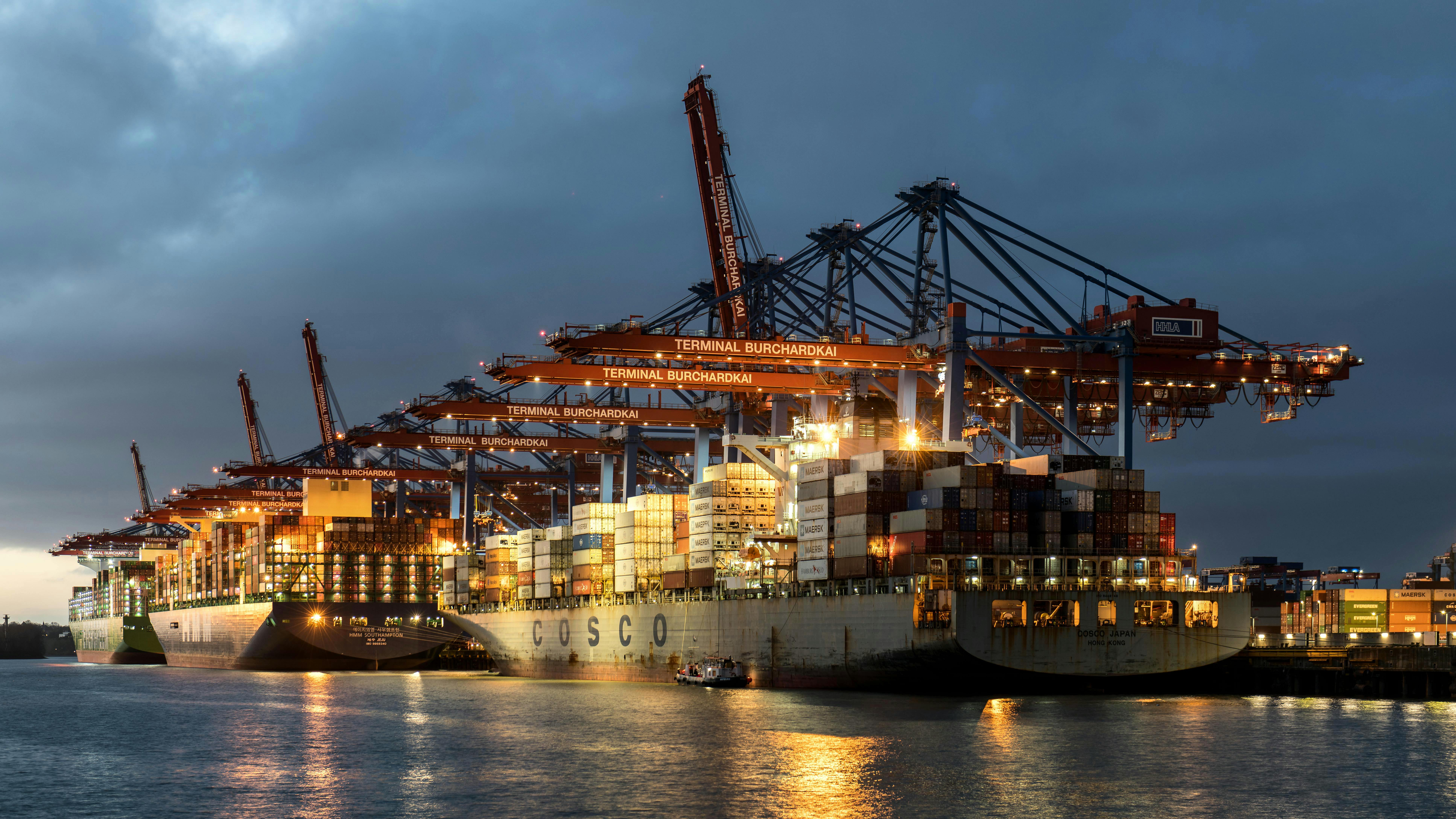 Container ships at port, global trade and supply chain infrastructure